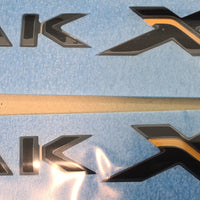 GENUINE WILDTRAK X LOGO EMBLEM BADGES ON FRONT DOOR LEFT & RIGHT 2022-2026