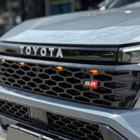 GR STYLE GLOSS COMPLETE GRILL AMBER LEDS TOYOTA HILUX 2026