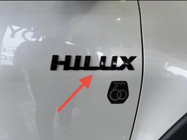 TOYOTA HILUX 2015-2025 GENUINE DOOR LOGO'S L/R