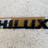 TOYOTA HILUX 2015-2025 GENUINE DOOR LOGO'S L/R