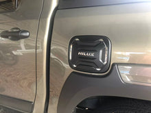 Load image into Gallery viewer, TOYOTA HILUX 2015-2024 GENUINE FUEL DOOR COVER