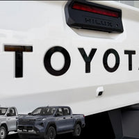 TOYOTA HILUX 2026 TAILGATE LOGO ABS MATT BLACK/GLOSS BLACK/WHITE/RED