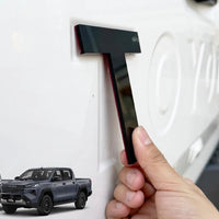 TOYOTA HILUX 2026 TAILGATE LOGO ABS MATT BLACK/GLOSS BLACK/WHITE/RED