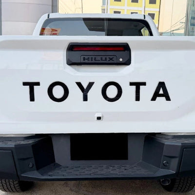 TOYOTA HILUX 2026 TAILGATE LOGO ABS MATT BLACK/GLOSS BLACK/WHITE/RED